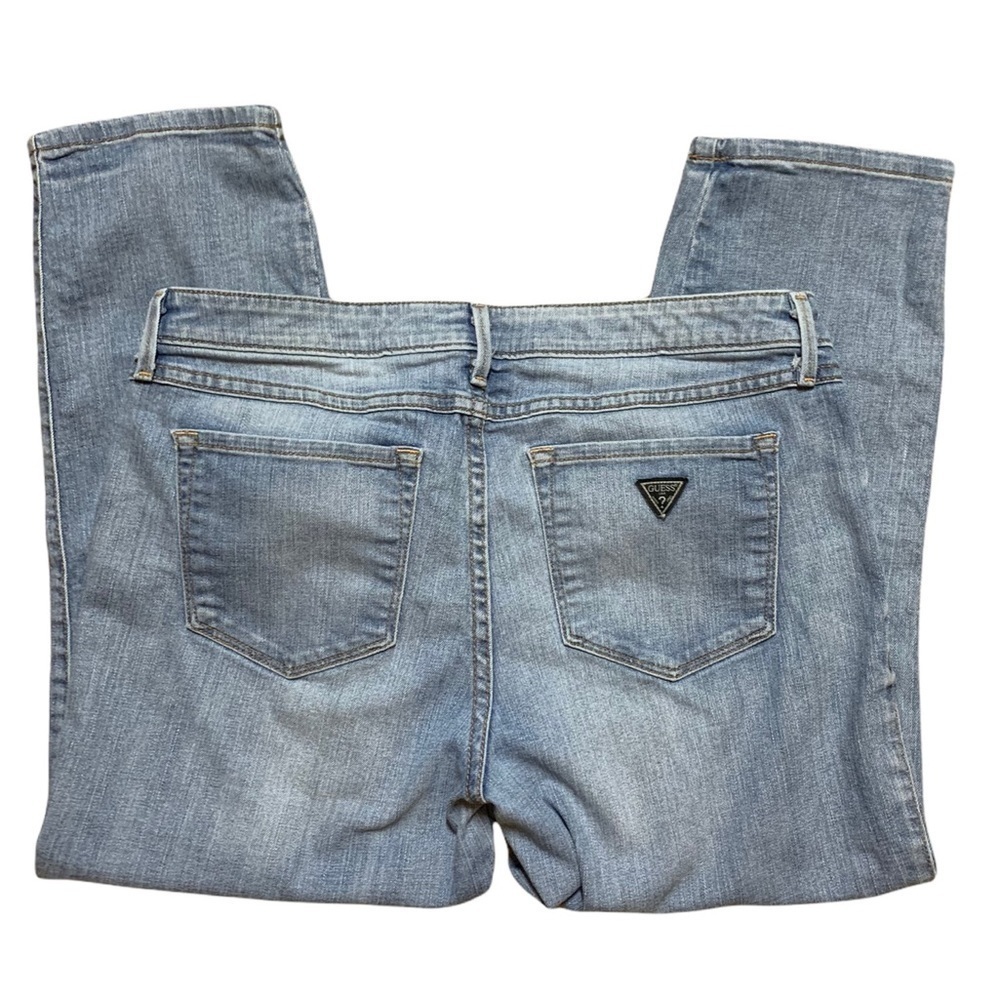 Vintage light wash Guess Jeans back pocket triangle patch